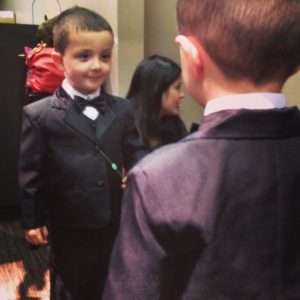 Toddler in tuxedo